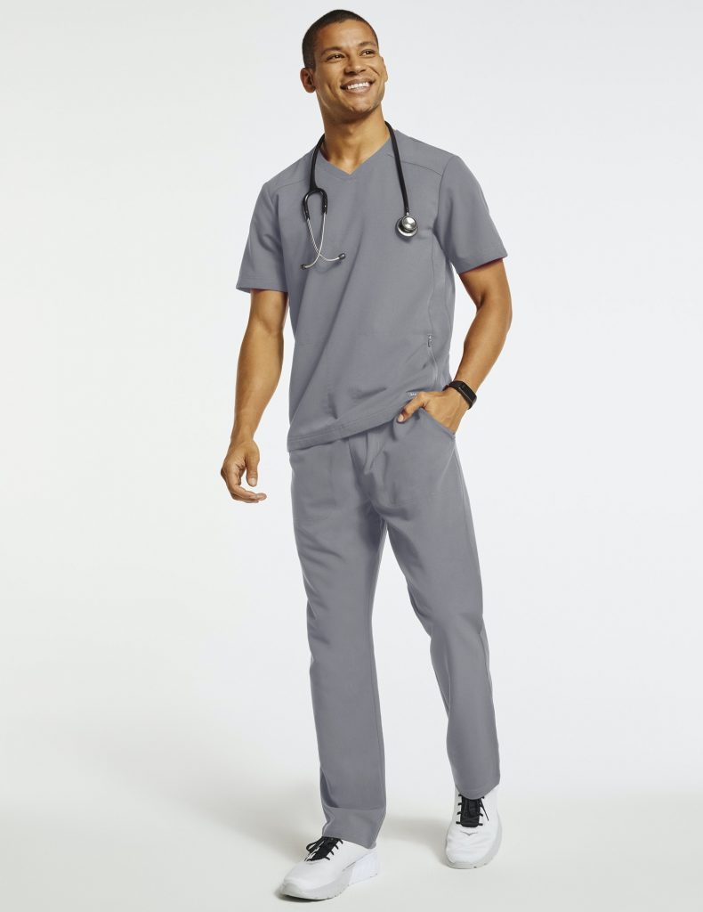 person wearing grey scrubs