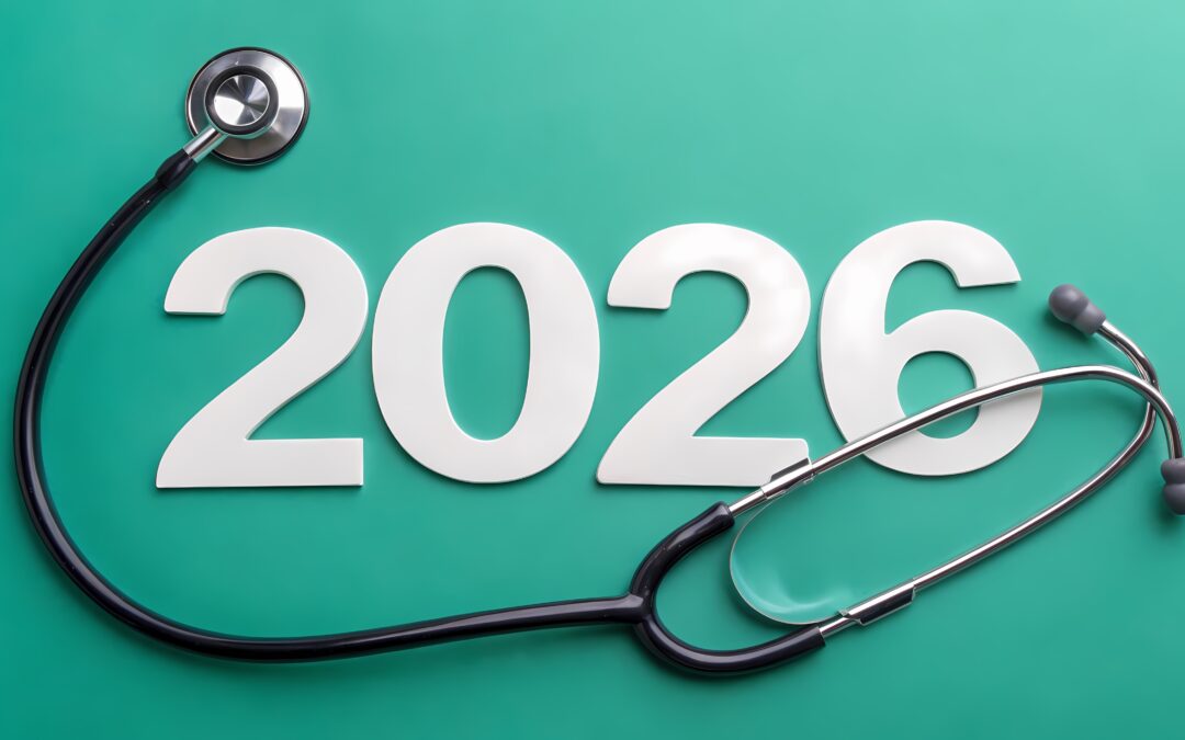 A stethoscope lying on a green surface with the numbers "2026" in large white font.
